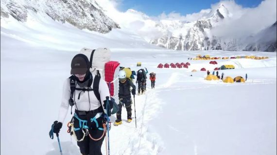 Climbers seen walking through the snow on Mount Everest